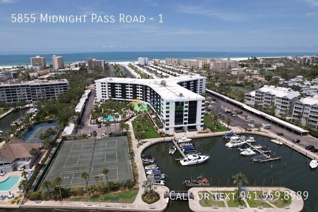 property at 5855 Midnight Pass Rd