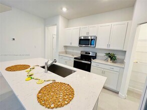 6949 Harbours Edge Ave in Greenacres, FL - Building Photo - Building Photo