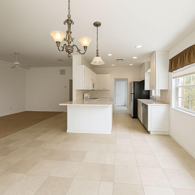 12040 SW Elsinore Dr in Port St. Lucie, FL - Building Photo - Building Photo