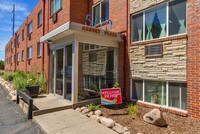 Building Photo - Asbury Plaza Apartamentos in Denver, Colorado