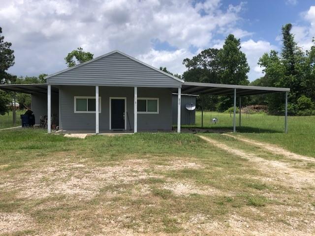 210 Ritchey Rd in Coldspring, TX - Building Photo