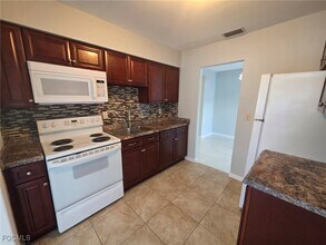 24 Temple Ct in Lehigh Acres, FL - Foto de edificio - Building Photo