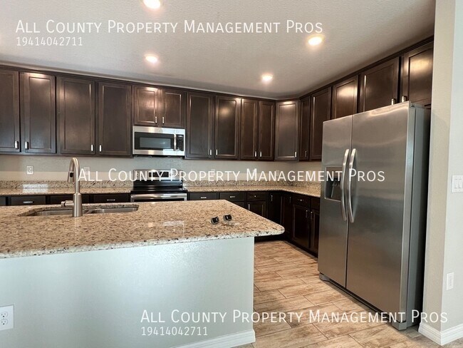 15293 Mille Fiore Blvd in Port Charlotte, FL - Building Photo - Building Photo
