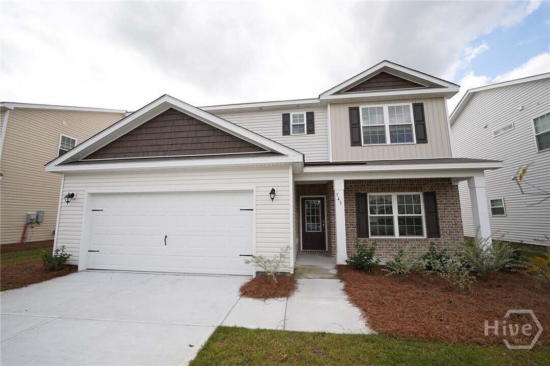 143 Guana Ln in Bloomingdale, GA - Foto de edificio