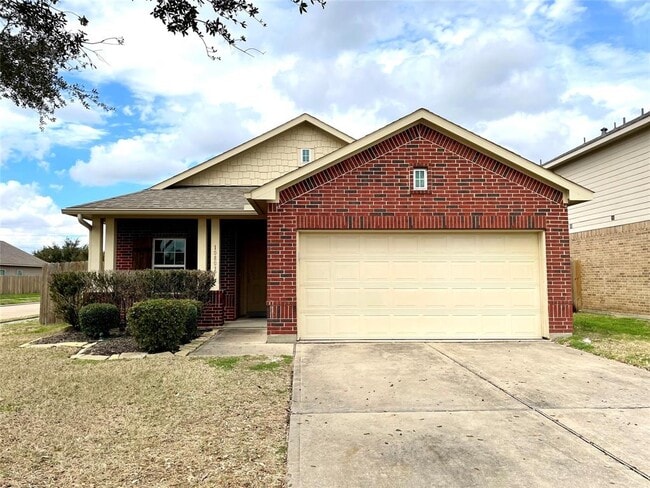 property at 10803 Woodwind Shadows Dr