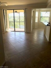9816 Giaveno Cir-Unit -1323 in Naples, FL - Building Photo - Building Photo