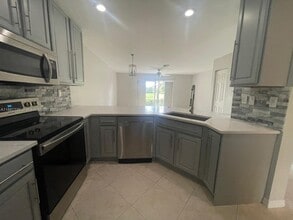 8660 S Southgate Shores Cir in Tamarac, FL - Building Photo - Building Photo