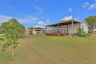7012 Bronco Ct in Buda, TX - Building Photo - Building Photo