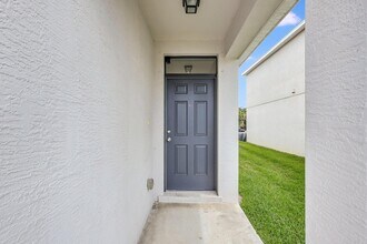 11181 SW Sophronia St in Port St. Lucie, FL - Building Photo - Building Photo