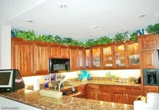 5635 Turtle Bay Dr in Naples, FL - Building Photo - Building Photo