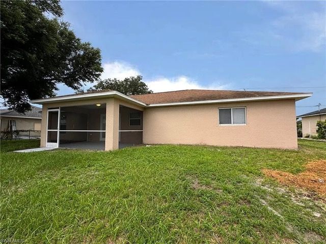 1009 Chapel Ave in Lehigh Acres, FL - Foto de edificio - Building Photo
