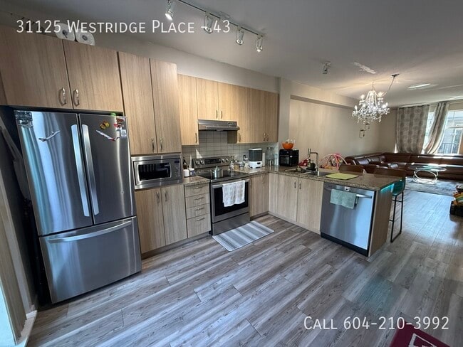 31125 Westridge Pl in Abbotsford, BC - Building Photo - Building Photo