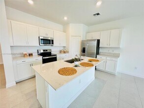 6909 Harbours Edge Ave in Greenacres, FL - Building Photo - Building Photo