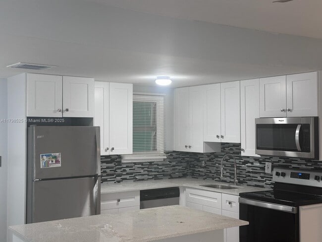 property at 209 SW 5th St