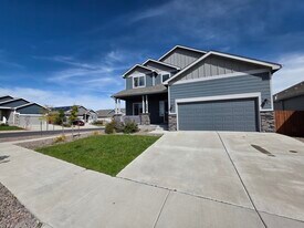 9679 Rainbow Bridge Dr in Peyton, CO - Building Photo