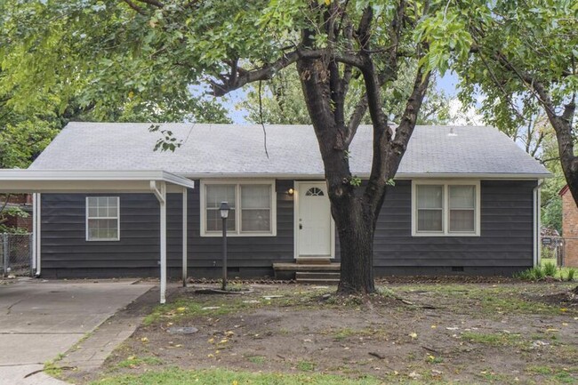 property at 3209 S Knoxville Ave