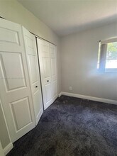 10403 NW 80th Ct in Tamarac, FL - Building Photo - Building Photo