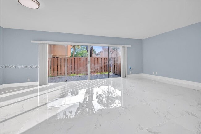 property at 8211 NW 8th St