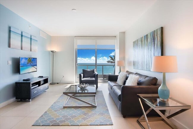 property at 6551 Collins Ave