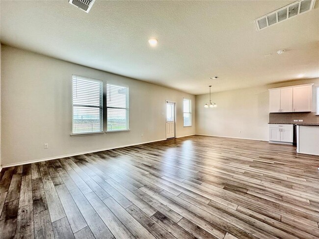 530 Pepperbark Loop in Mustang Ridge, TX - Building Photo - Building Photo