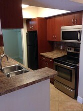 5760 Rock Island Rd-Unit -308 in Tamarac, FL - Foto de edificio - Building Photo