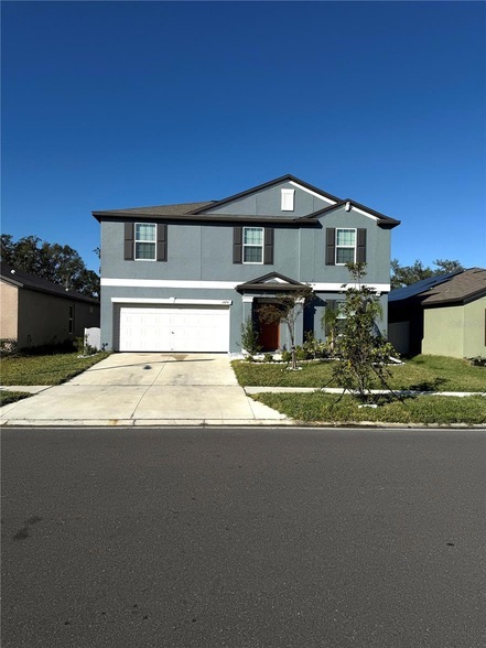 1424 Tahitian Sunrise Dr, Unit 1505-08 in Plant City, FL - Building Photo