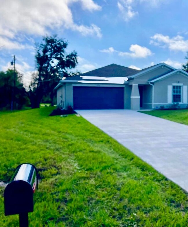 1256 Birchcrest Blvd in Port Charlotte, FL - Building Photo - Building Photo