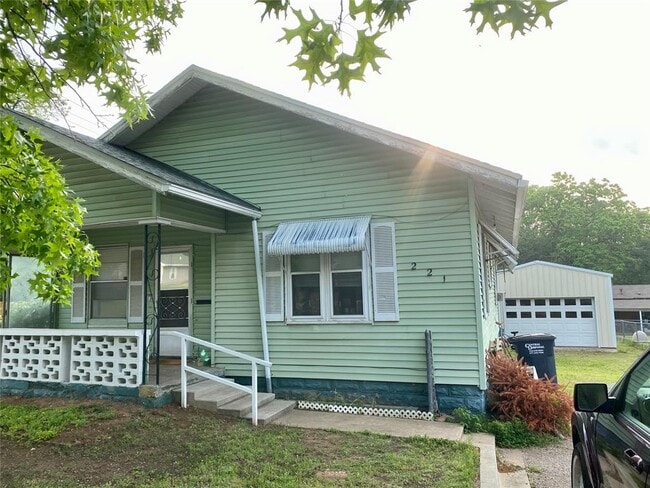 property at 221 N Pesotum Ave