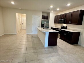 15257 Wildflower Cir in Naples, FL - Building Photo - Building Photo