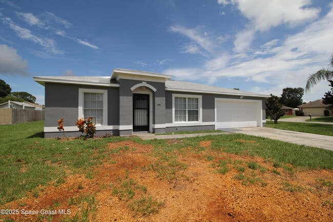 property at 399 Fluvia Ave SE