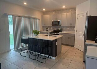 1314 Asher Mason Ave in Kissimmee, FL - Building Photo - Building Photo