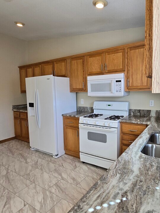 2584 Carriage Dr in Milliken, CO - Building Photo