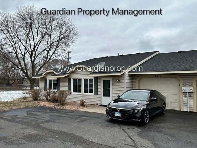 property at 8411 Yates Ave N