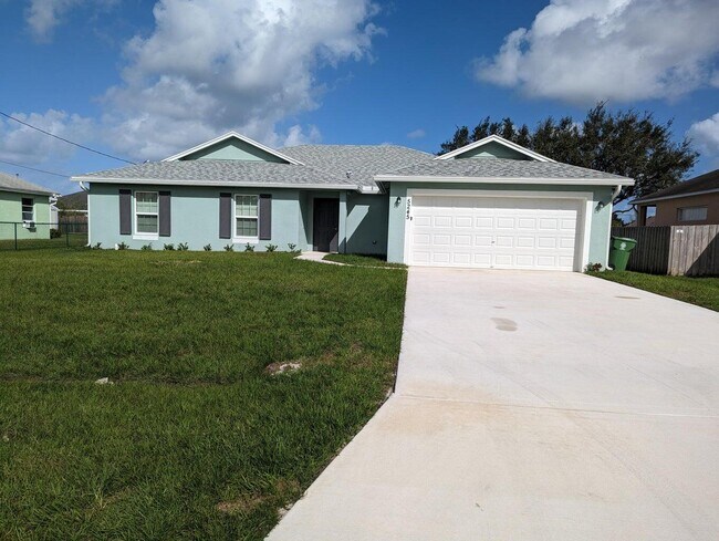 property at 5245 NW Gamma St