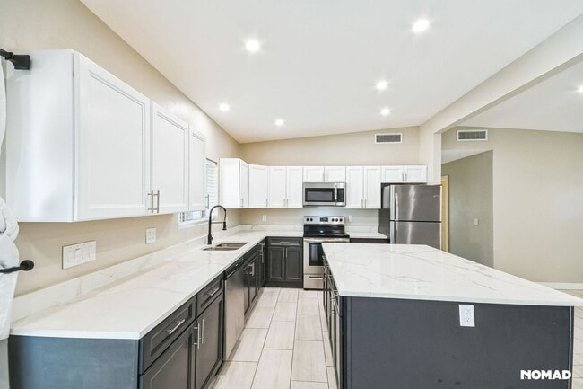 property at 3555 E 4th St