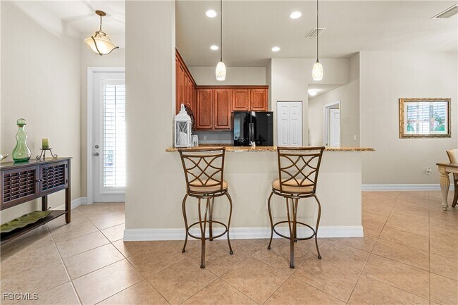 10535 Carolina Willow Dr in Ft. Myers, FL - Foto de edificio - Building Photo