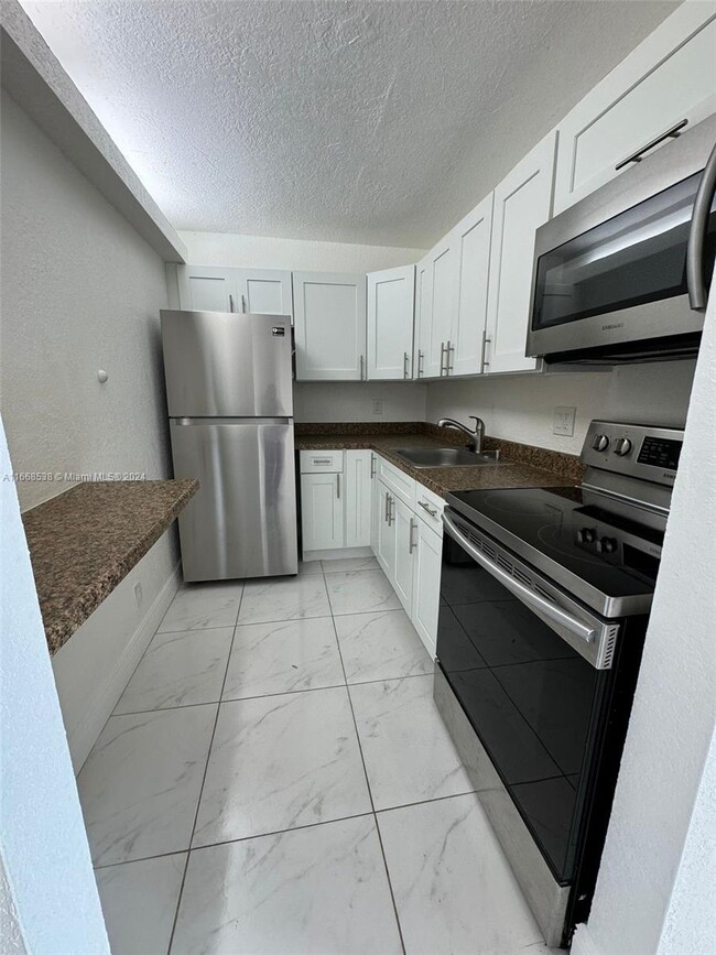 property at 8511 NW 8th St
