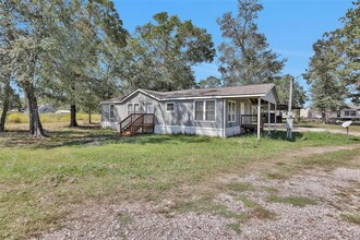 12180 Rebel Rd in Cleveland, TX - Building Photo - Building Photo