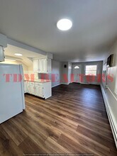 302 E Clinton St, Unit 302 E Clinton in Durand, MI - Foto de edificio - Building Photo