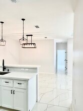 1006 Escondido Ln E, Unit A in Harlingen, TX - Foto de edificio - Building Photo