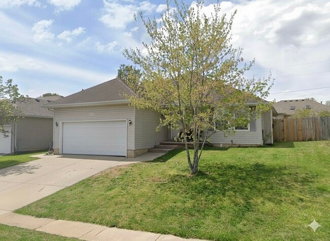 property at 410 W White Ash St