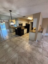 3999 NW Cinnamon Tree Cir, Unit 3999 in Jensen Beach, FL - Foto de edificio - Building Photo