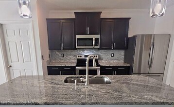 965 Newton Cir in Rockledge, FL - Building Photo - Building Photo