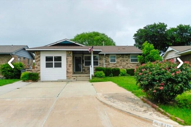 property at 6411 NW Compass Dr