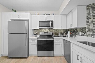 8851 Wiles Rd in Coral Springs, FL - Building Photo