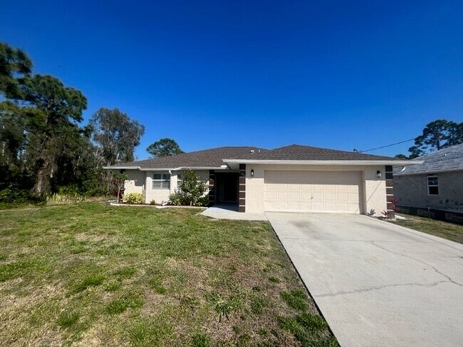 1126 Calmar Ave in Lehigh Acres, FL - Building Photo - Building Photo