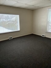 203 Burns St, Unit Unit 4 in Charlevoix, MI - Building Photo - Building Photo