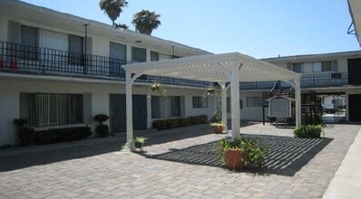 Madrid Apartments in Buena Park, CA - Building Photo - Building Photo