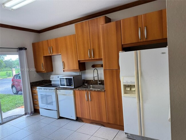 property at 6922 NW 179th St