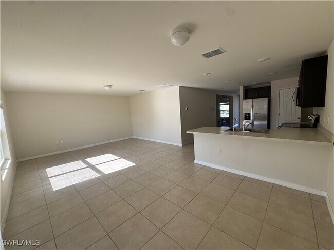 1028 Allman Ave in Lehigh Acres, FL - Building Photo - Building Photo